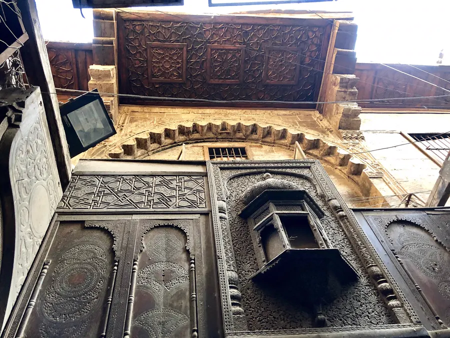 Carved mashrabiya facade in historic Islamic Cairo