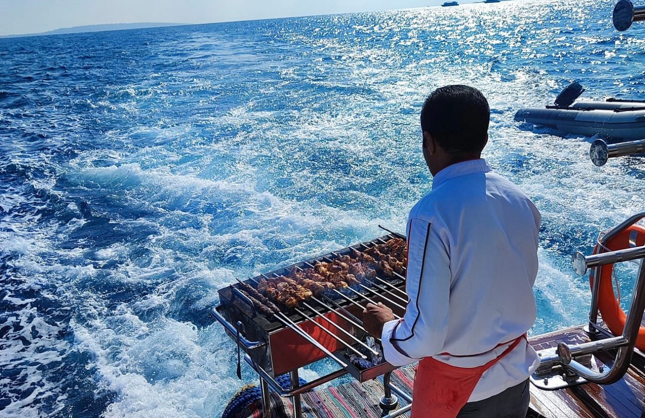 Fresh BBQ grilled at the stern of the Elite VIP boat