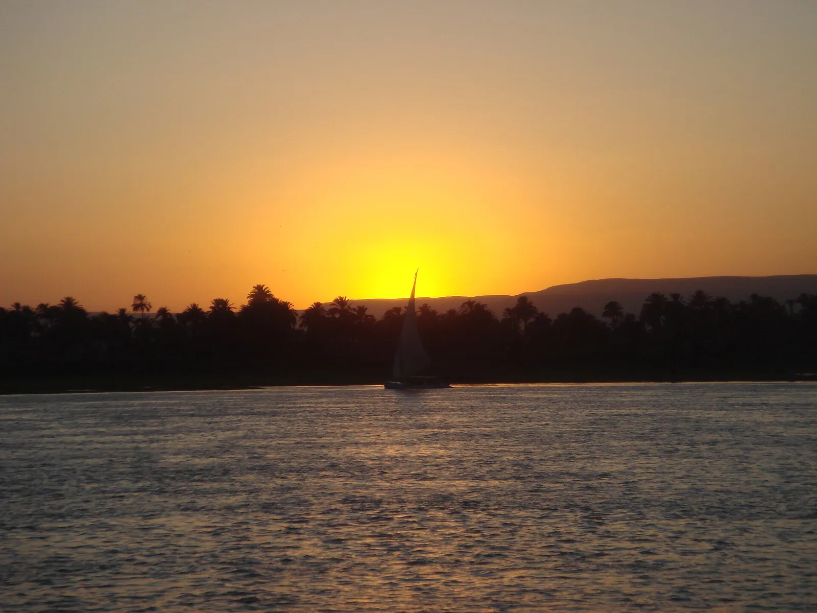 Felucca on the Nile at sunset; the captain is tipped separately from your guide