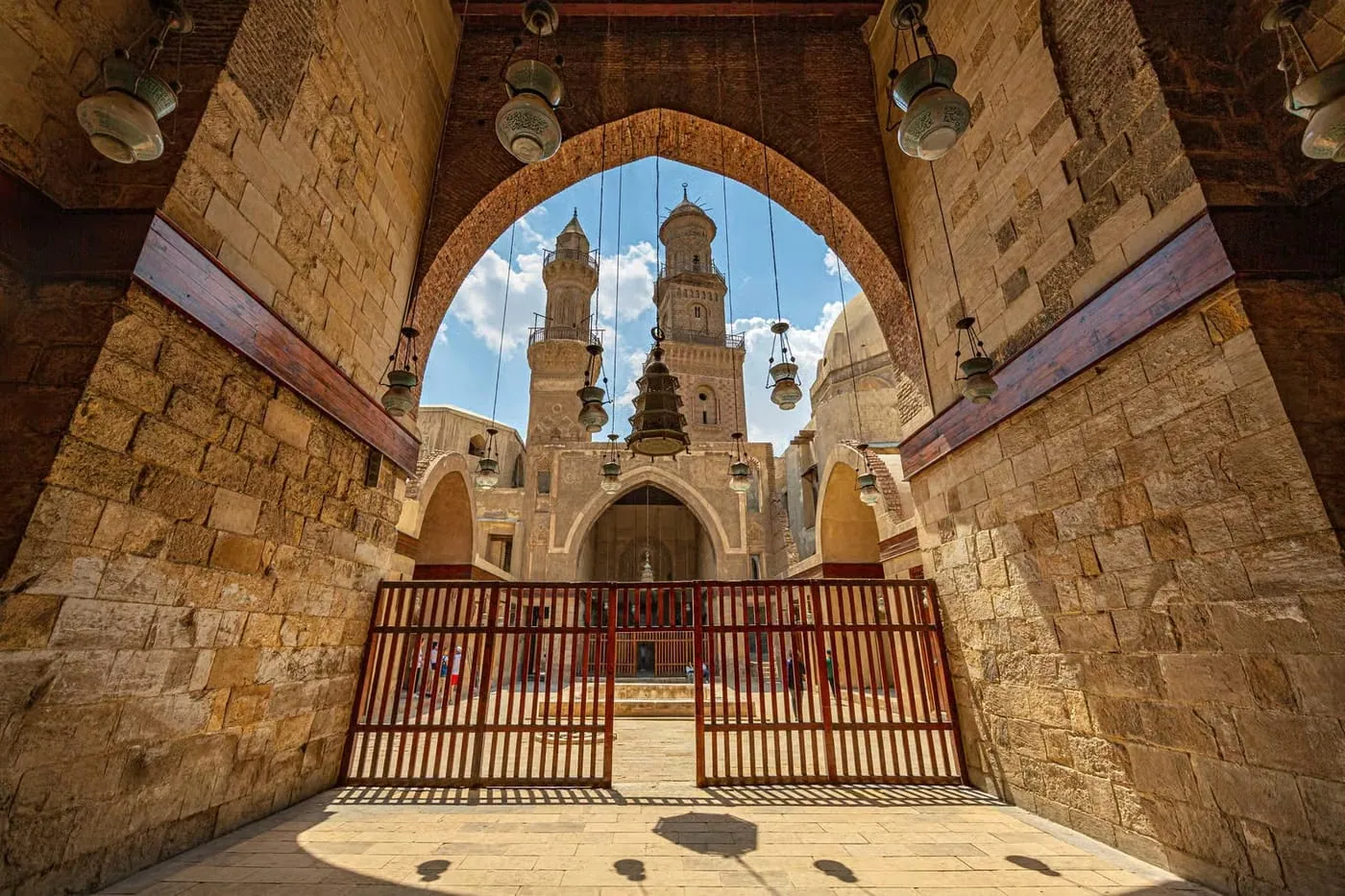 Historic arch and minarets in Old Cairo