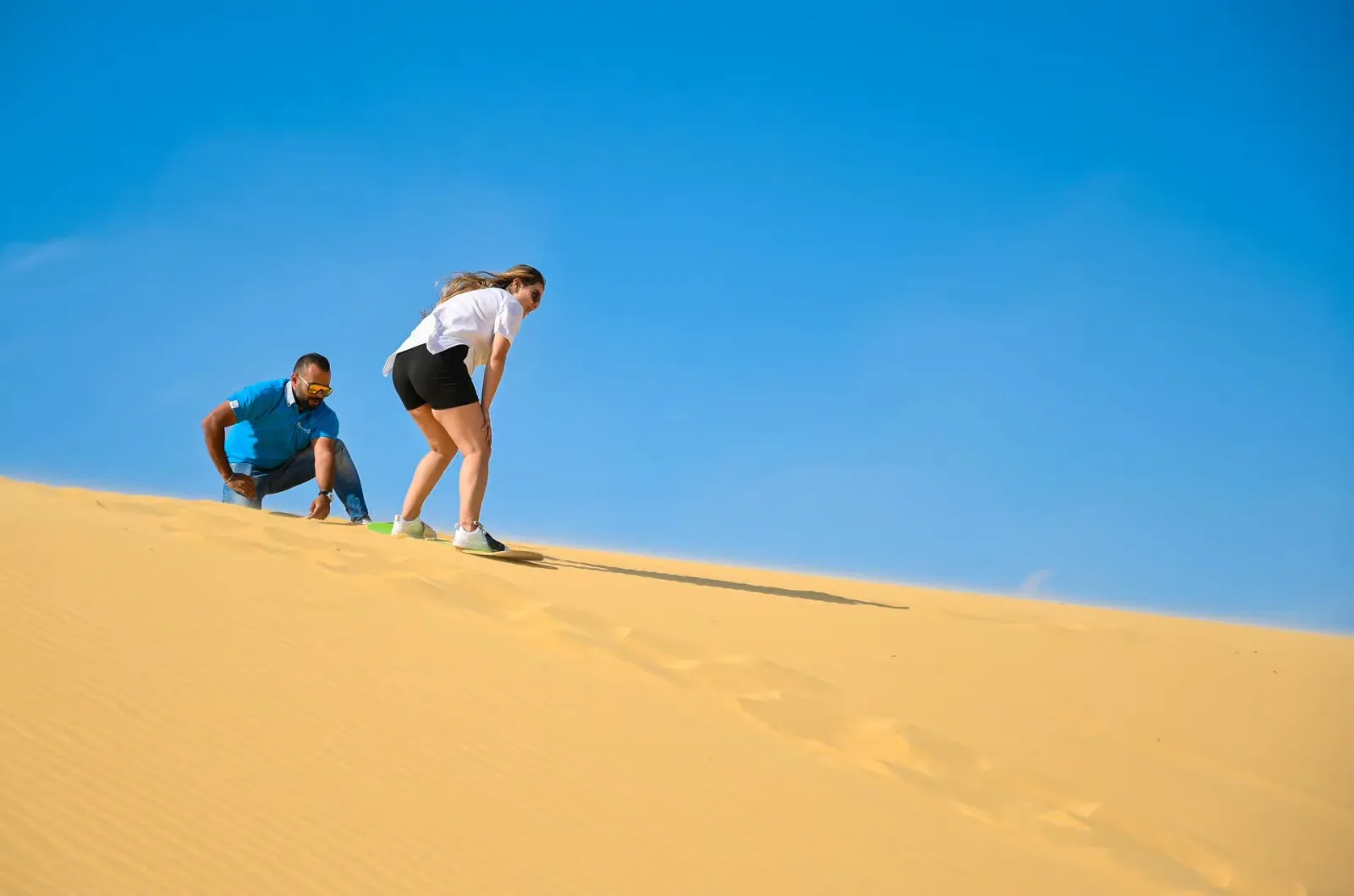 Sandboarding on the dunes