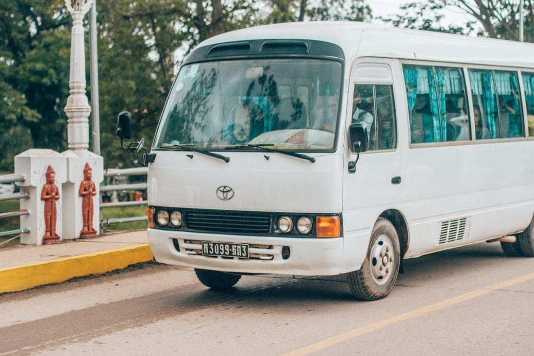 White high-roof minibus for hotel and airport group transfers